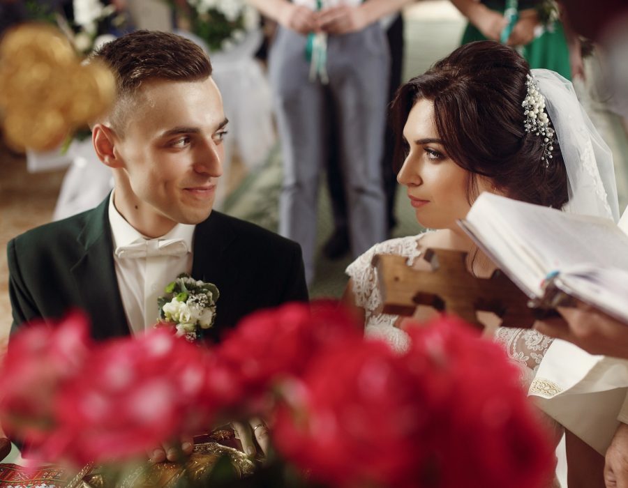 emotional-couple-at-wedding-ceremony-in-christian-catholic-church.jpg